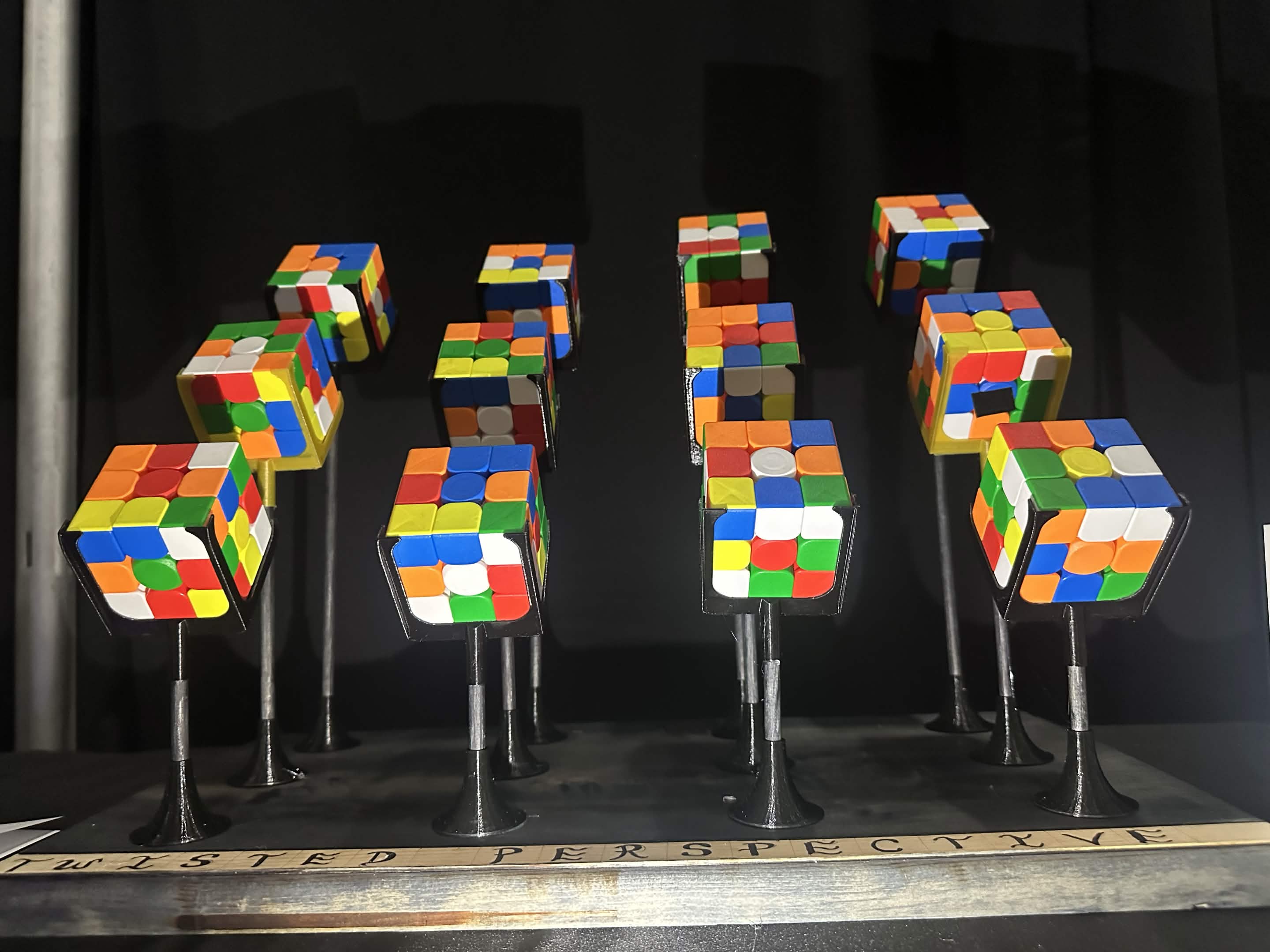 Installation: twelve cubes tipped forward on their mounts